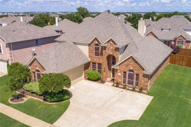 5315 Summit Knoll Trl, Sachse, TX 75048 - traditional home with driveway, brick siding, a chimney, and roof with shingles
