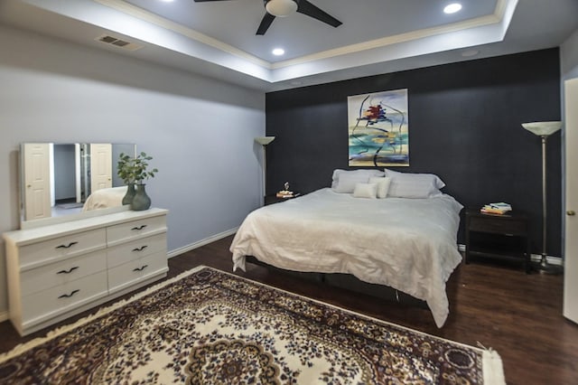 5315 Summit Knoll Trl, Sachse, TX 75048 - bedroom with a raised ceiling, dark wood-style flooring, crown molding, baseboards, and recessed lighting
