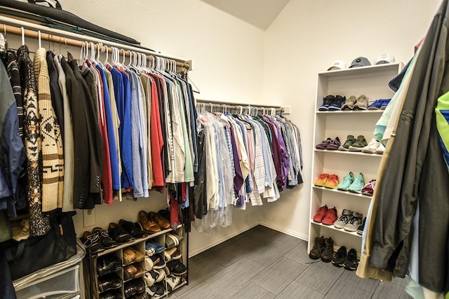 5315 Summit Knoll Trl, Sachse, TX 75048 - walk in closet with vaulted ceiling and wood finish floors
