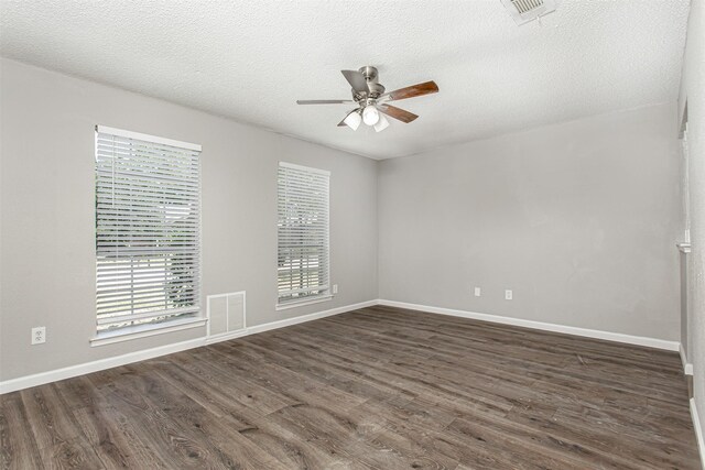 7102 Timberline Dr, Rowlett, TX 75089 - bedroom featuring wood finished floors, ceiling fan, and baseboards