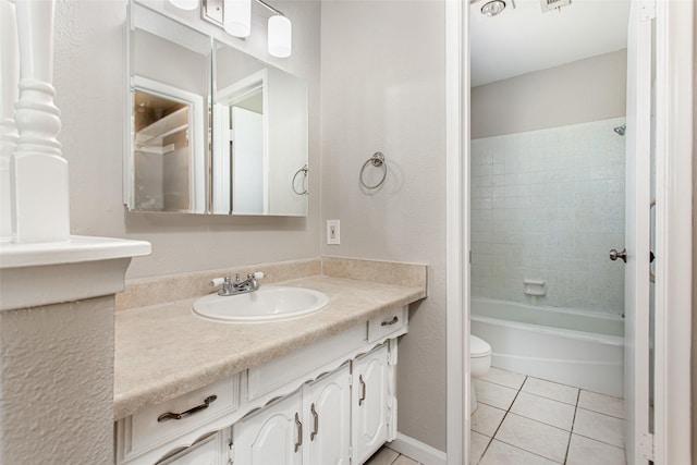 7102 Timberline Dr, Rowlett, TX 75089 - full bathroom featuring tile patterned floors, vanity, toilet, and bathing tub / shower combination