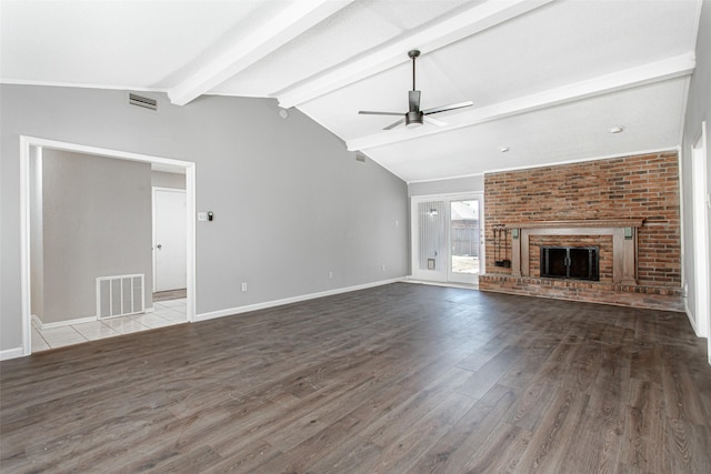 7102 Timberline Dr, Rowlett, TX 75089 - unfurnished living room featuring ceiling fan, wood finished floors, baseboards, and a fireplace