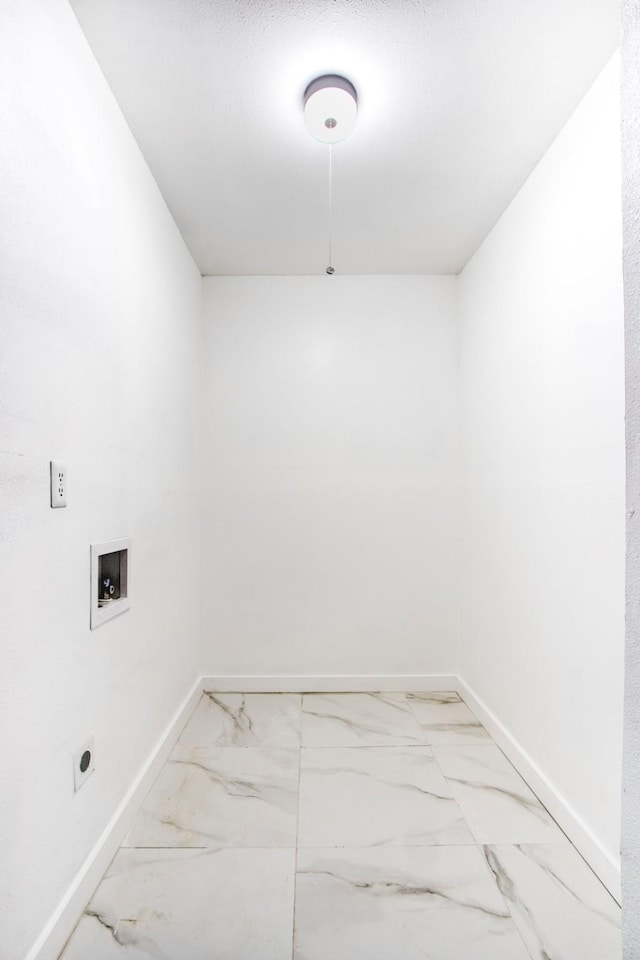 11521 Fernald Ave, Dallas, TX 75218 - clothes washing area with hookup for a washing machine, baseboards, marble look tile flooring, and electric dryer hookup