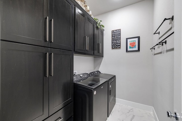 507 N Eagle Point Rd, Van Alstyne, TX 75495 - laundry area featuring separate washer and dryer, baseboards, cabinet space, and light marble finish flooring