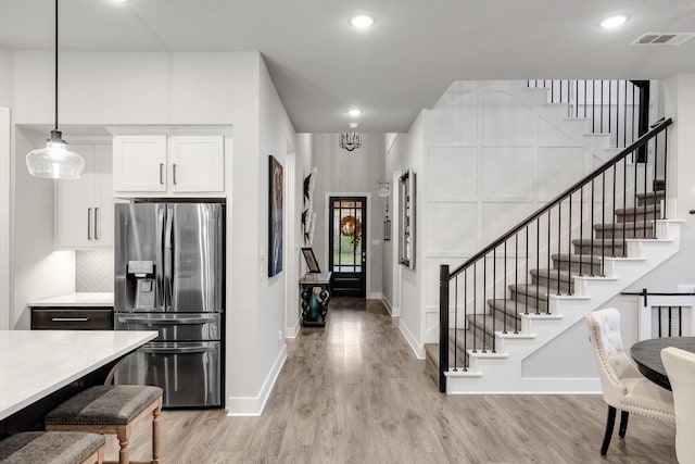 507 N Eagle Point Rd, Van Alstyne, TX 75495 - foyer featuring stairs, light wood-type flooring, baseboards, and recessed lighting