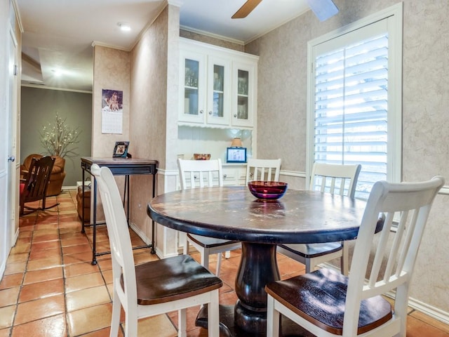 12151 Crestline Ave, Dallas, TX 75244 - dining room featuring ornamental molding, a ceiling fan, and light tile patterned flooring