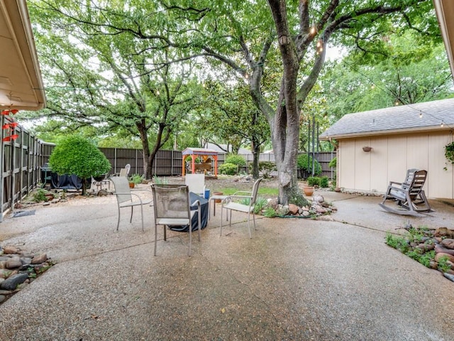 12151 Crestline Ave, Dallas, TX 75244 - view of patio featuring a fenced backyard