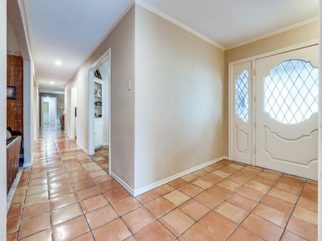 12151 Crestline Ave, Dallas, TX 75244 - foyer with baseboards, light tile patterned floors, and crown molding