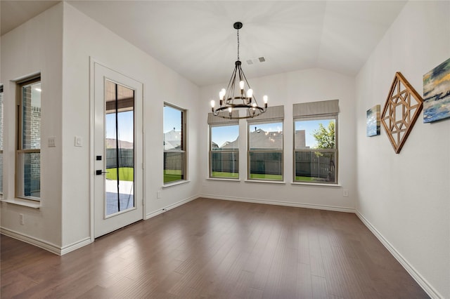 2901 Little Wonder Ln, Northlake, TX 76247 - unfurnished dining area featuring a chandelier, plenty of natural light, dark wood-style flooring, and vaulted ceiling
