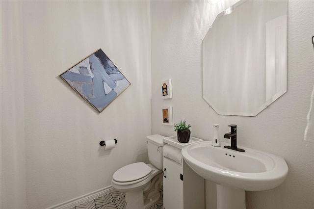 2901 Little Wonder Ln, Northlake, TX 76247 - half bathroom with a sink, toilet, and baseboards
