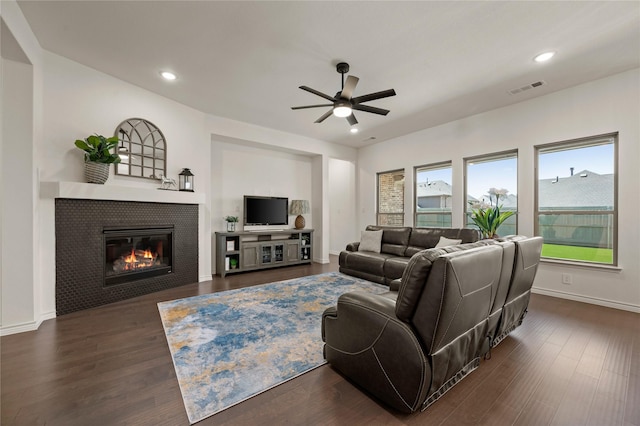 2901 Little Wonder Ln, Northlake, TX 76247 - living area featuring ceiling fan, a tile fireplace, dark wood finished floors, and recessed lighting