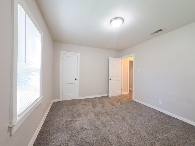 4318 York St, Dallas, TX 75210 - spare room with carpet floors and baseboards