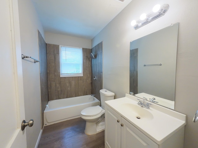4318 York St, Dallas, TX 75210 - full bathroom with wood finished floors, toilet, vanity, and shower / bath combination