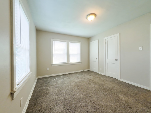 4318 York St, Dallas, TX 75210 - carpeted spare room featuring baseboards