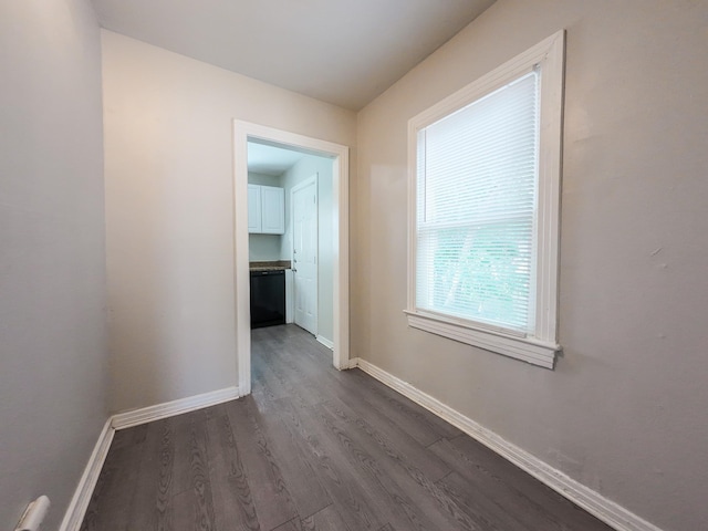 4318 York St, Dallas, TX 75210 - corridor with dark wood-style floors and baseboards