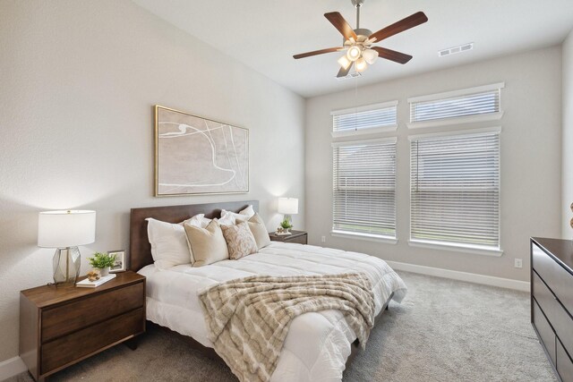 2415 Preakness Pl, Celina, TX 75009 - bedroom with light carpet, baseboards, and ceiling fan