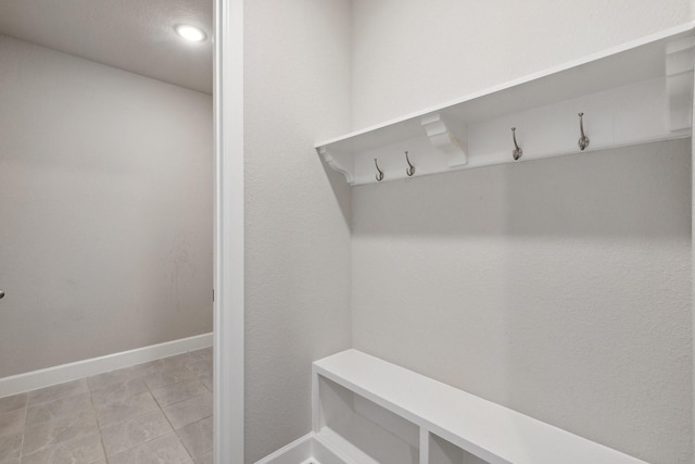 2415 Preakness Pl, Celina, TX 75009 - mudroom featuring baseboards, light tile patterned floors, and recessed lighting