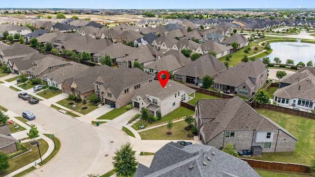2415 Preakness Pl, Celina, TX 75009 - aerial perspective of suburban area with a large body of water