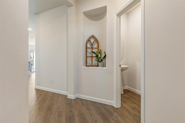 3932 Oak Creek Cir, Denison, TX 75020 - hallway with wood finished floors and baseboards
