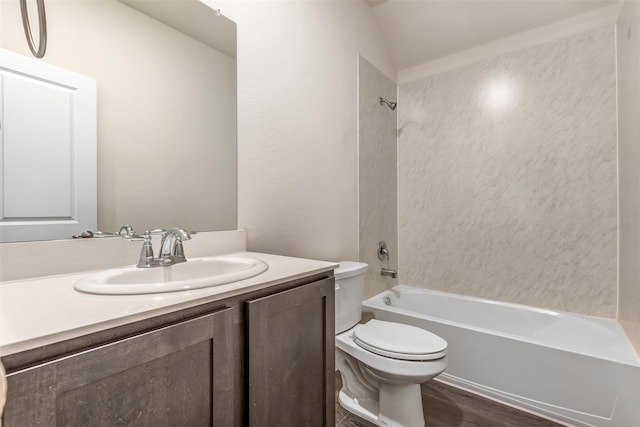 3932 Oak Creek Cir, Denison, TX 75020 - full bath with toilet, vanity, shower / bathtub combination, and wood finished floors