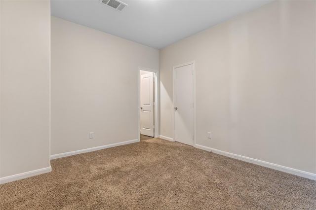 3932 Oak Creek Cir, Denison, TX 75020 - carpeted spare room featuring baseboards