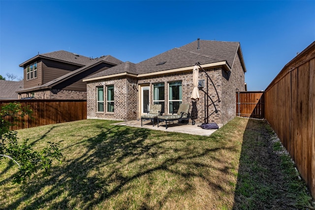 3932 Oak Creek Cir, Denison, TX 75020 - rear view of house with brick siding, a patio, and a shingled roof