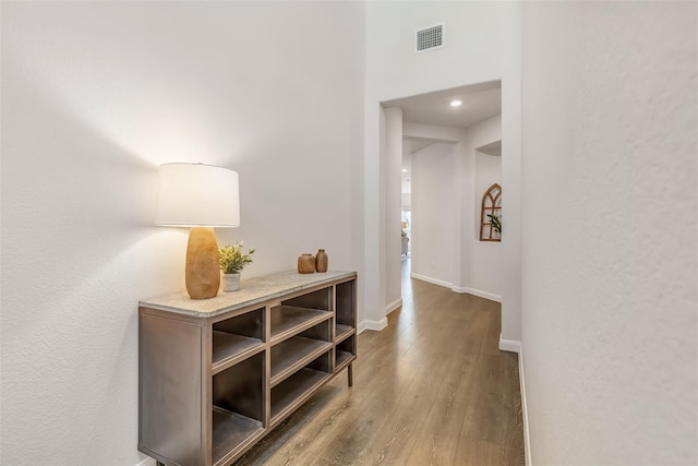 3932 Oak Creek Cir, Denison, TX 75020 - corridor with wood finished floors and baseboards