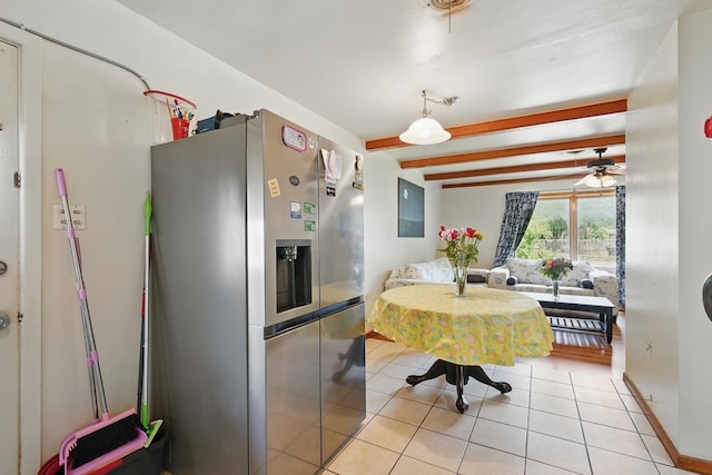dining area with beam ceiling, light tile patterned floors, ceiling fan, and baseboards