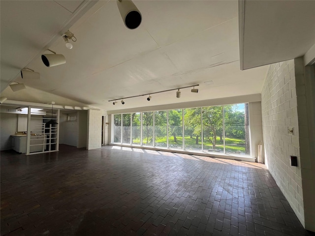 1934 Kessler Pkwy, Dallas, TX 75208 - unfurnished living room featuring track lighting