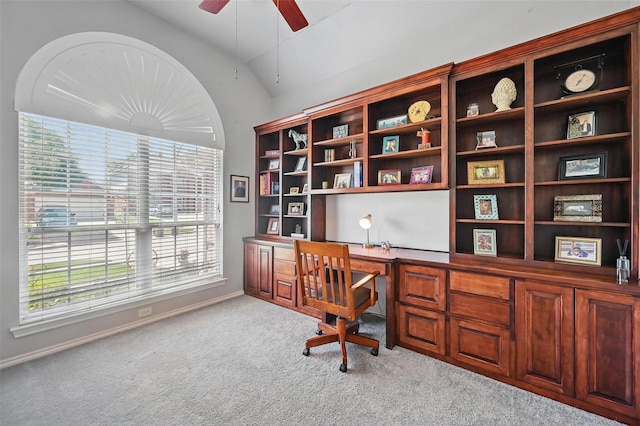 2813 Calico Rock Dr, Fort Worth, TX 76131 - carpeted home office with plenty of natural light, lofted ceiling, ceiling fan, built in study area, and baseboards
