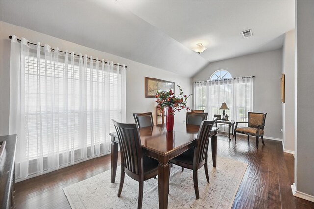 2813 Calico Rock Dr, Fort Worth, TX 76131 - dining room featuring lofted ceiling, baseboards, and dark wood-style flooring