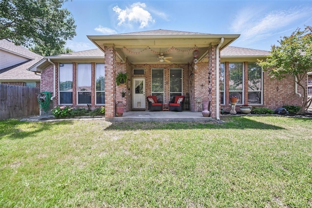 2813 Calico Rock Dr, Fort Worth, TX 76131 - rear view of house with ceiling fan, a patio area, brick siding, and a shingled roof