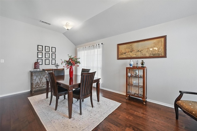 2813 Calico Rock Dr, Fort Worth, TX 76131 - dining area with baseboards, wood finished floors, and vaulted ceiling