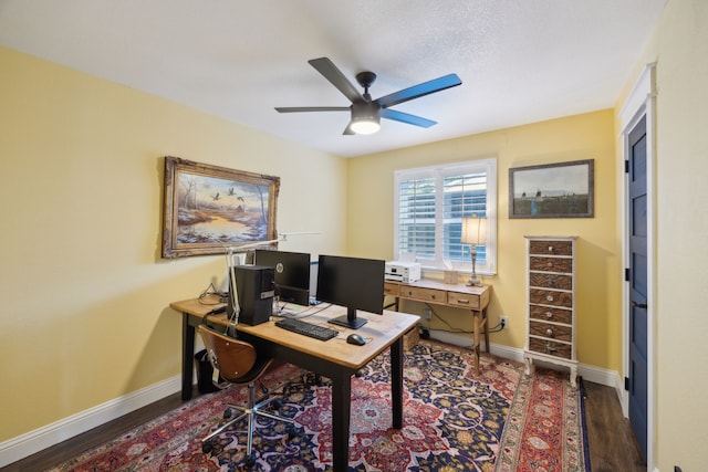 8538 Grenadier Dr, Dallas, TX 75238 - home office featuring wood finished floors, a ceiling fan, and baseboards