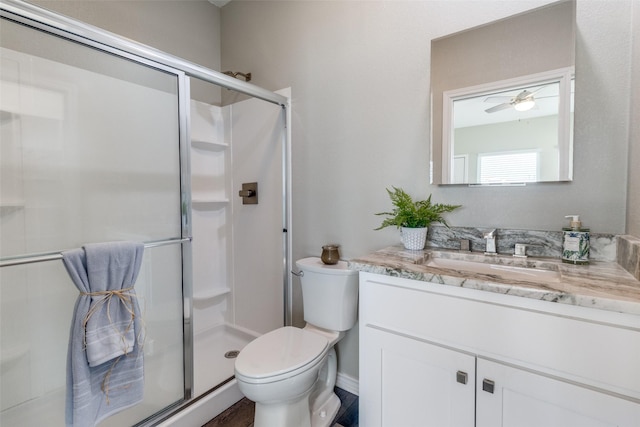 2164 Tanglewood Blvd Unit D 210, Pottsboro, TX 75076 - bathroom featuring toilet, a stall shower, vanity, and a ceiling fan