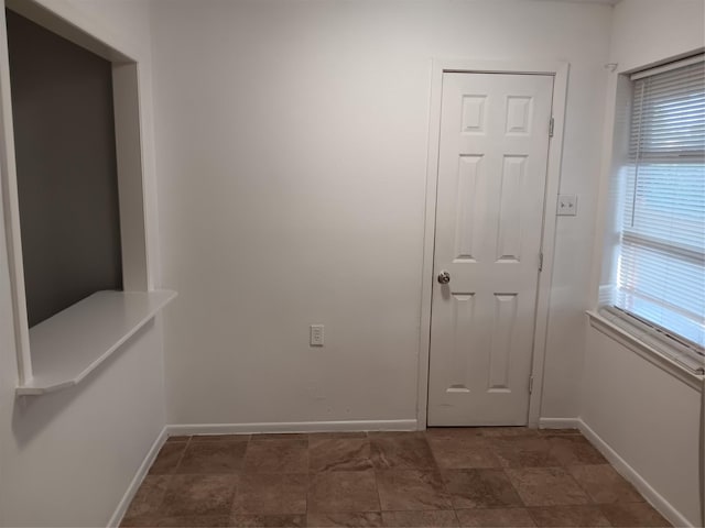 12249 High Pointe Cir, Dallas, TX 75243 - unfurnished room with baseboards