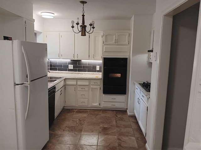12249 High Pointe Cir, Dallas, TX 75243 - kitchen with black appliances, a warming drawer, white cabinets, and light countertops