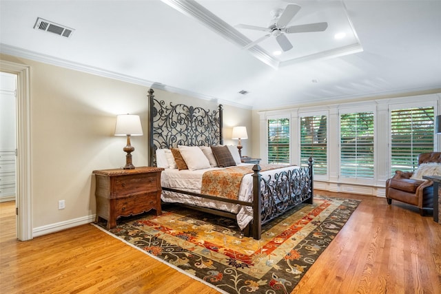 4710 Bobbitt Dr, Dallas, TX 75229 - bedroom featuring crown molding, wood finished floors, a raised ceiling, baseboards, and ceiling fan