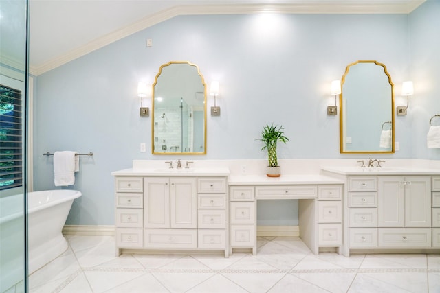 4710 Bobbitt Dr, Dallas, TX 75229 - full bathroom with double vanity, a freestanding tub, lofted ceiling, crown molding, and baseboards