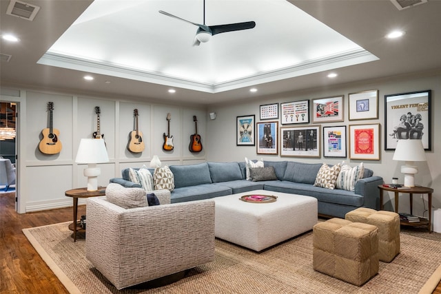 4710 Bobbitt Dr, Dallas, TX 75229 - living area featuring crown molding, a raised ceiling, recessed lighting, wood finished floors, and a ceiling fan