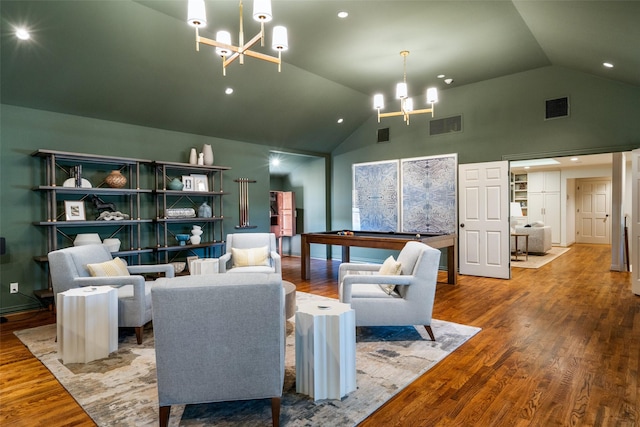 4710 Bobbitt Dr, Dallas, TX 75229 - living area featuring a chandelier, high vaulted ceiling, wood finished floors, and recessed lighting