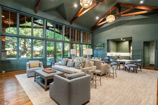 4710 Bobbitt Dr, Dallas, TX 75229 - community lobby with high vaulted ceiling, a decorative wall, and beamed ceiling