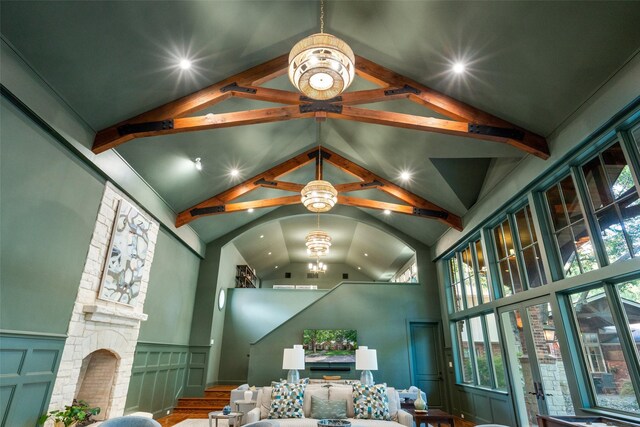 4710 Bobbitt Dr, Dallas, TX 75229 - detailed view of beamed ceiling, a fireplace, recessed lighting, and a chandelier