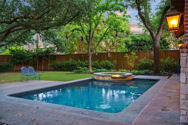 4710 Bobbitt Dr, Dallas, TX 75229 - pool at dusk featuring a pool with connected hot tub and a patio