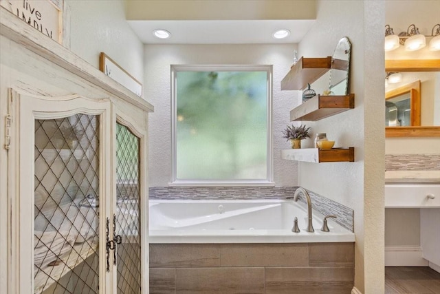 1345 Stillwater Rd, Waco, TX 76708 - full bathroom with a garden tub and vanity