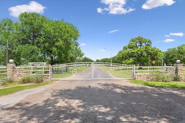 1345 Stillwater Rd, Waco, TX 76708 - view of asphalt road with a gate