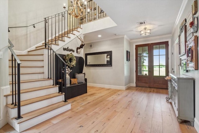 1345 Stillwater Rd, Waco, TX 76708 - entrance foyer featuring crown molding, stairs, a chandelier, hardwood / wood-style floors, and baseboards