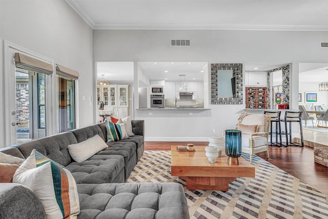4218 High Star Ln, Dallas, TX 75287 - living room featuring wood finished floors, ornamental molding, and baseboards