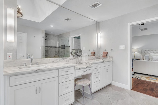 4218 High Star Ln, Dallas, TX 75287 - bathroom with a stall shower, double vanity, marble look tiles, and baseboards
