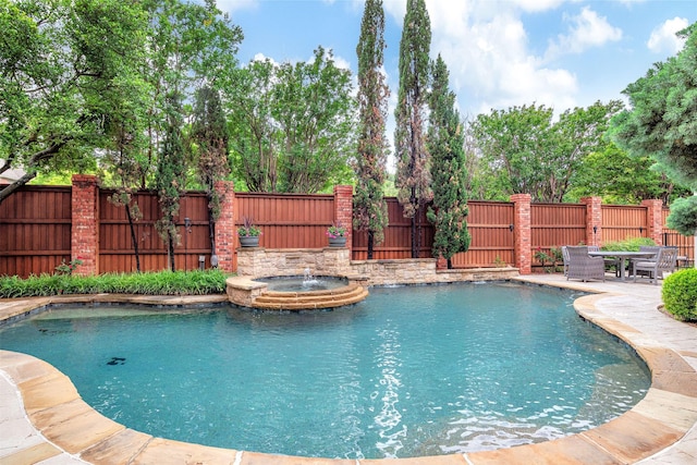 5861 Broadwell Dr, Plano, TX 75093 - view of pool featuring a fenced backyard, a pool with connected hot tub, and a patio